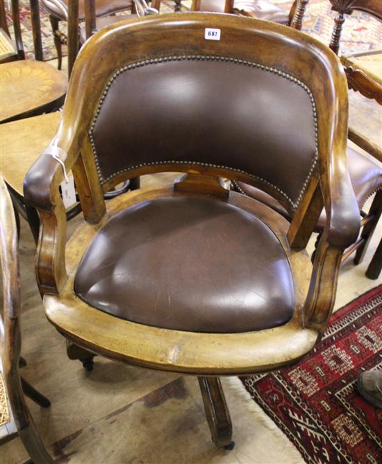 Mahogany swivel desk chair, upholstered leather